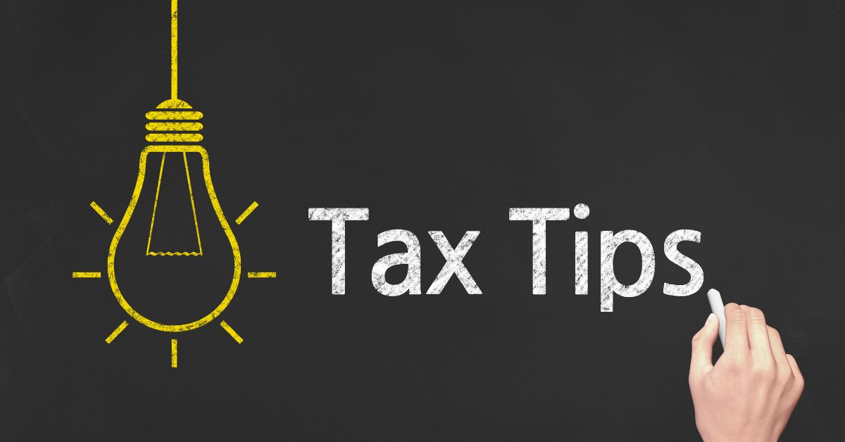 Chalkboard with light bulb and Tax Tips written